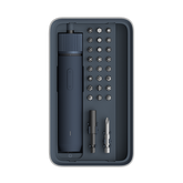 Set of tools including a drill and various bits in a black case on a white background