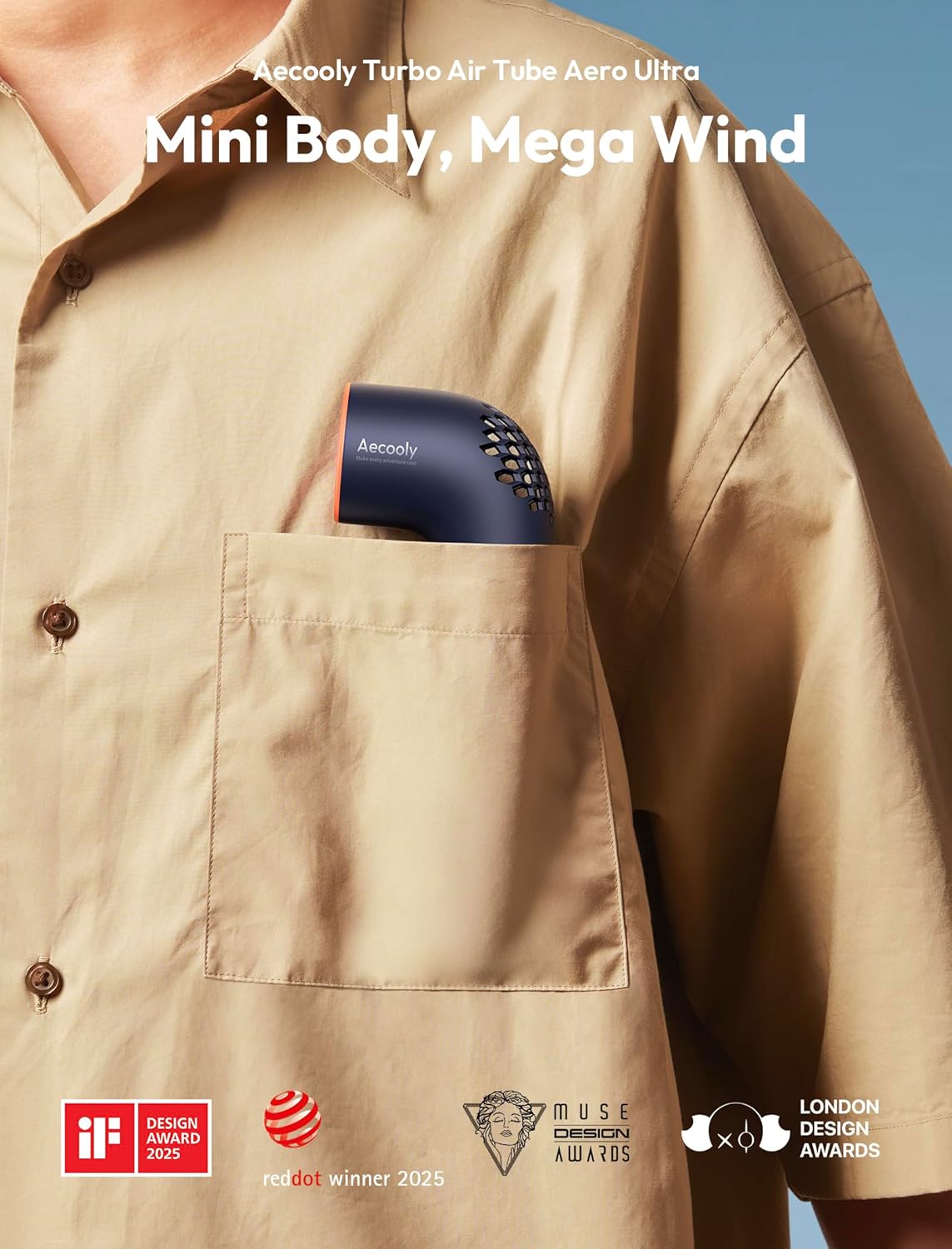 Person wearing a beige shirt with a small fan device in the pocket, against a blue sky.