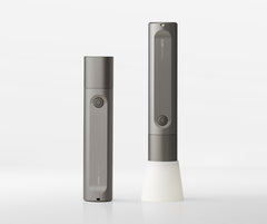 Two gray electronic devices on a white background