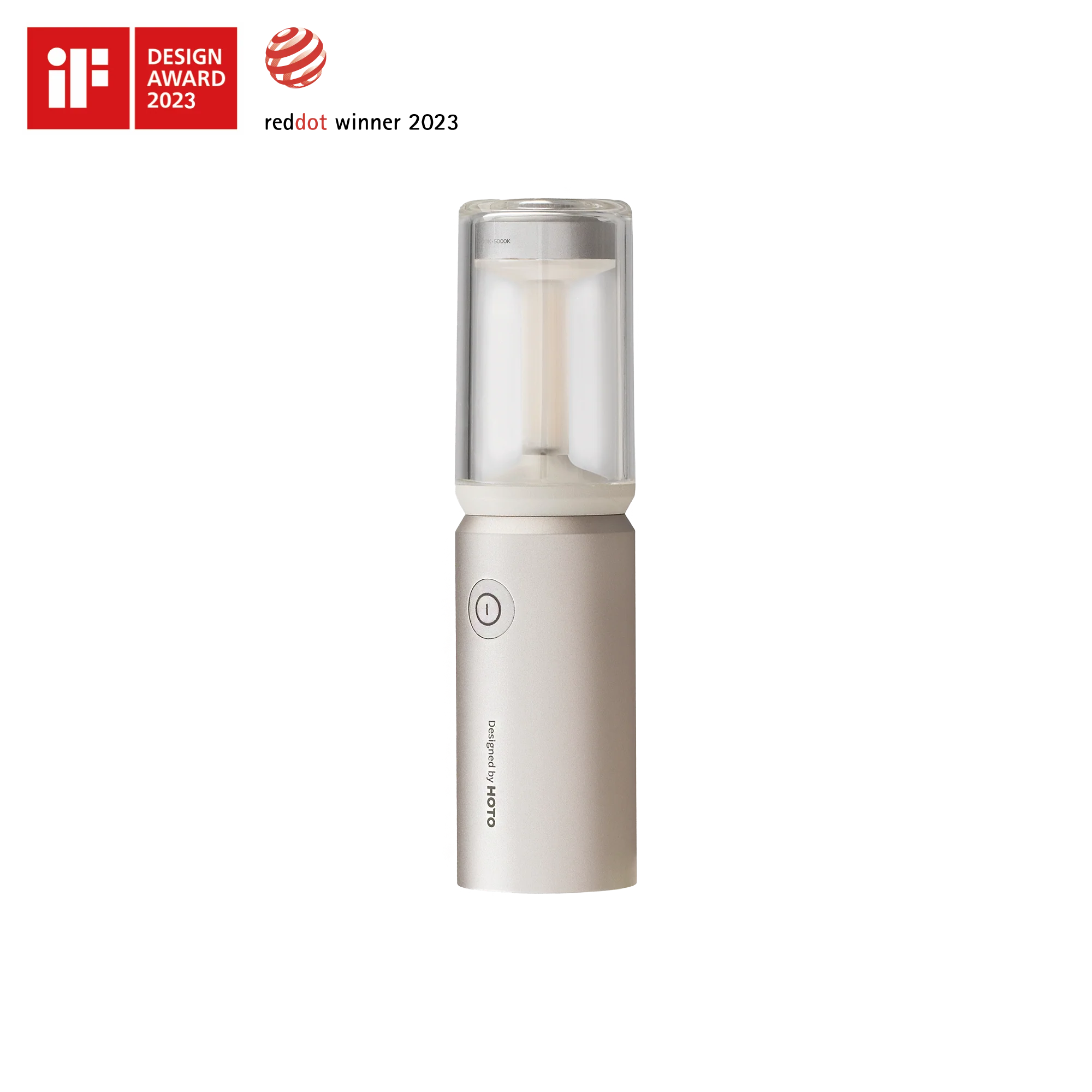 White handheld device with clear top section on a white background, featuring design awards.