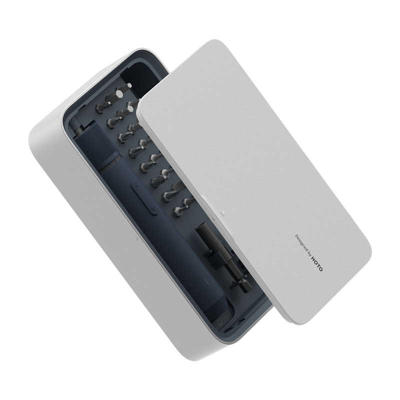 Gray electronic device with open cover displaying internal components on a white background