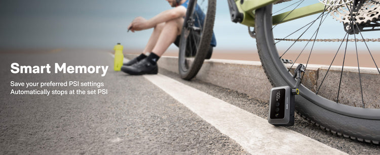 Bicycle with a pressure sensor on the tire, sitting on a road with a blurred background