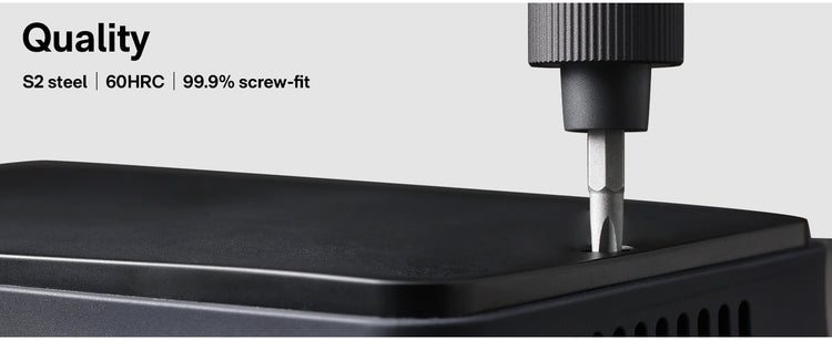 Screwdriver being used on a black surface with text indicating material and quality specifications.