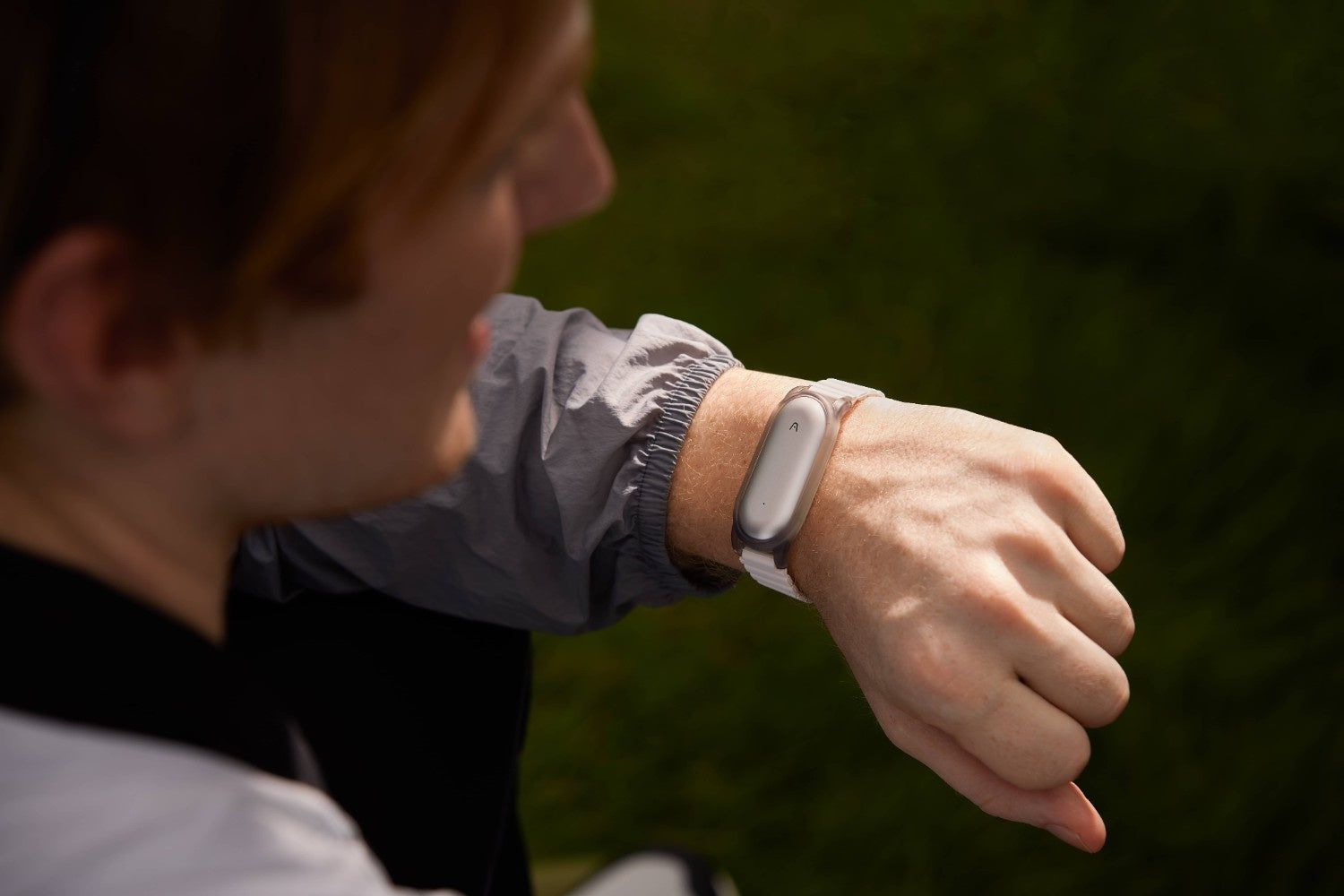 Person wearing a Plaud Notepin like a watch