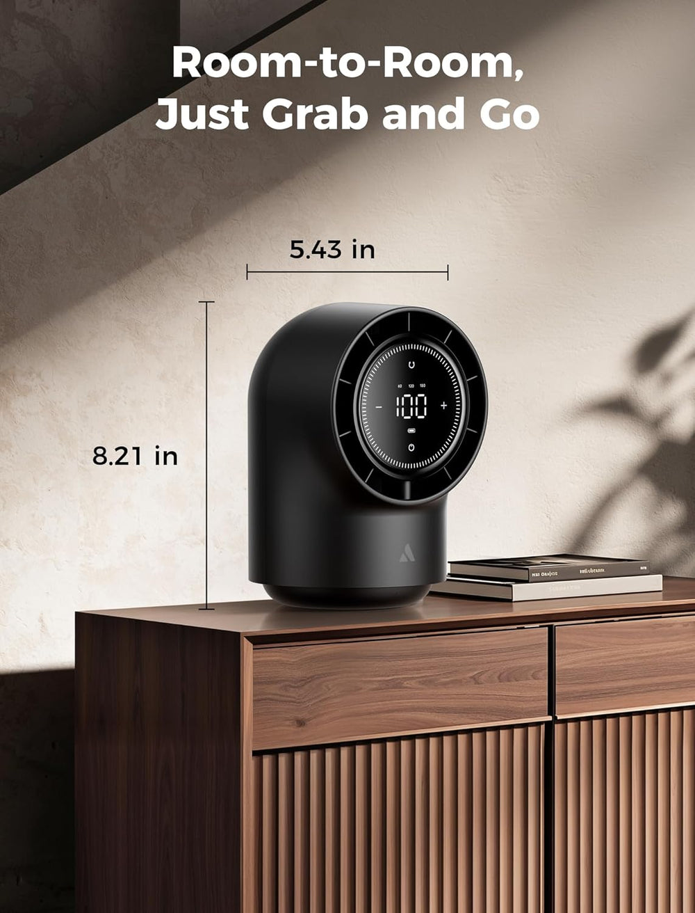 Black desk fan on a wooden cabinet with dimensions displayed